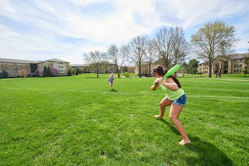 photo: students playing whiffle ball
